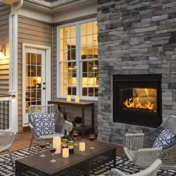 Outdoor patio with stone fireplace