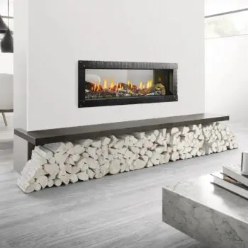 Modern fireplace with stacked logs