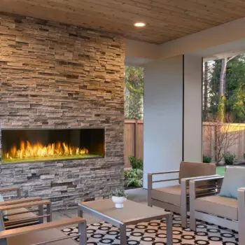 Outdoor seating area with fireplace