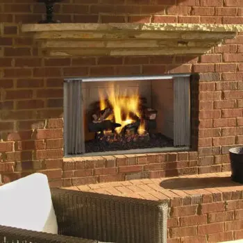Outdoor brick fireplace with flames