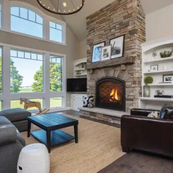 Living room stone fireplace scene
