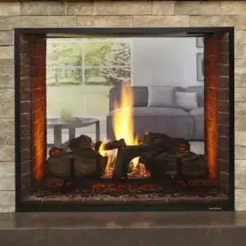 Modern fireplace with roaring fire