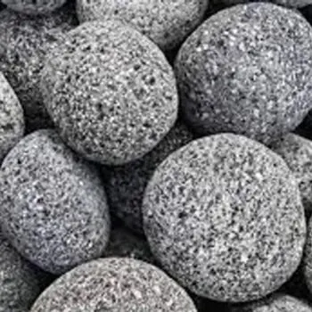 Gray textured round fireplace stones