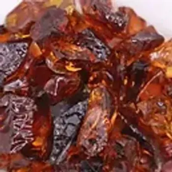 Shiny dark brown resin pieces