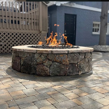 Stone fire pit with flames