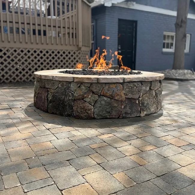 Stone fire pit with flames